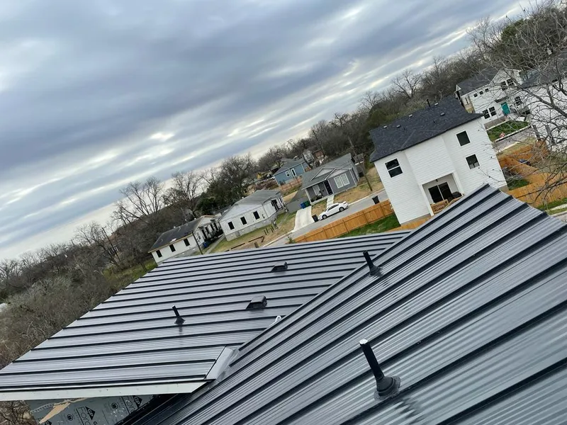 Standing seam metal roof panels with vents for Skylight Repair in Kaneohe Base
